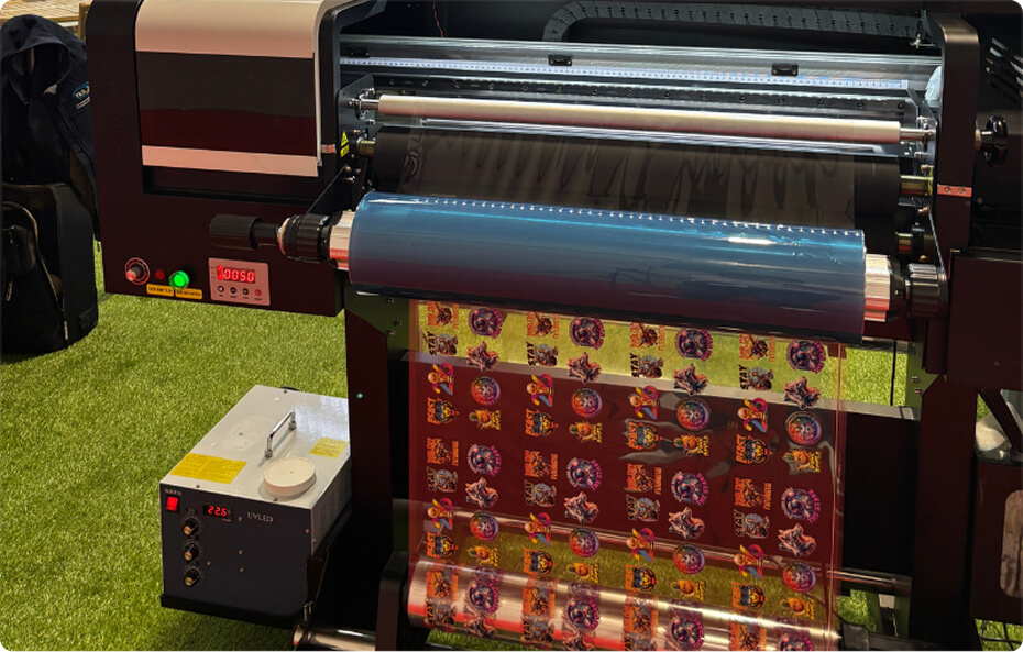 UV printing equipment producing colourful World Cup-inspired designs for accessories and merchandise